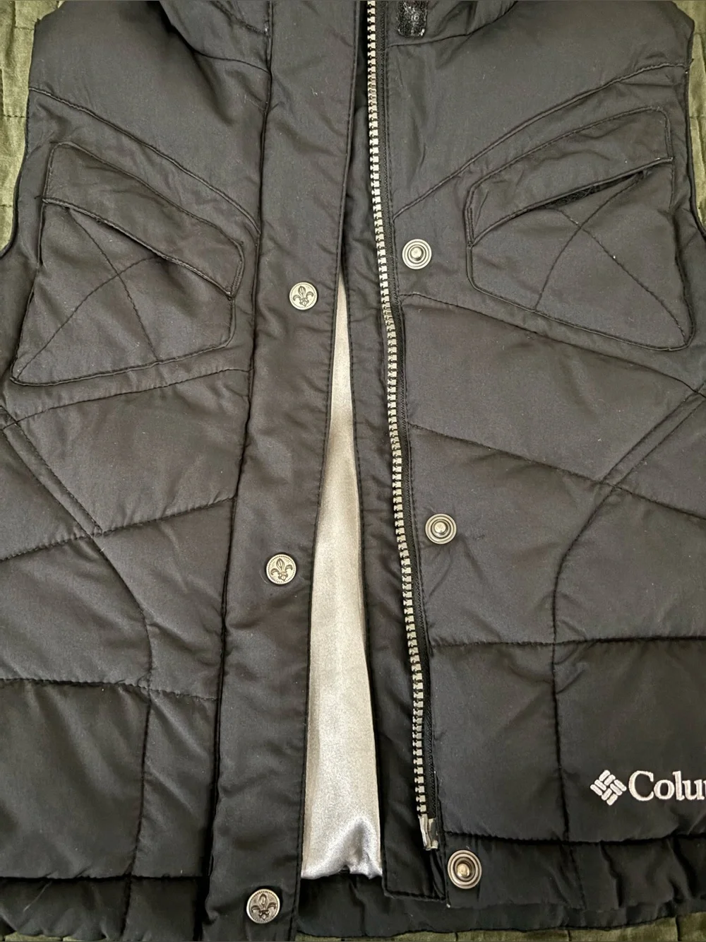 Columbia Kids Black Hooded Vest with Silver Lining and fleur-de-lis.